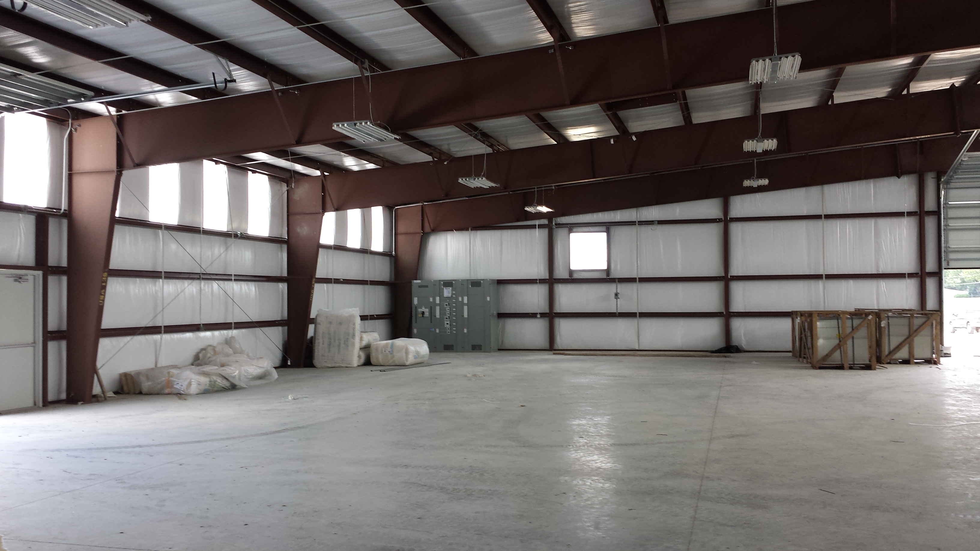 Installing a Membrane Roof over a Metal Roof on a PreEngineered Metal